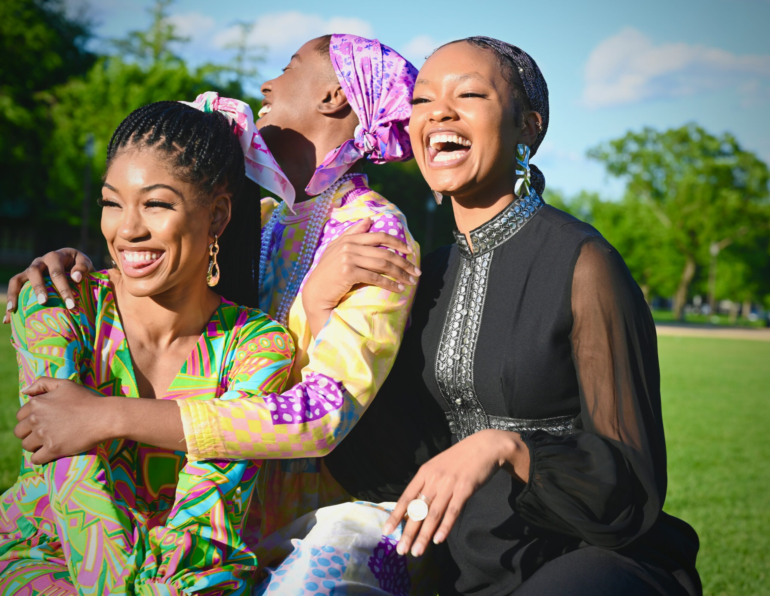 group of black women laughing together living mindfully