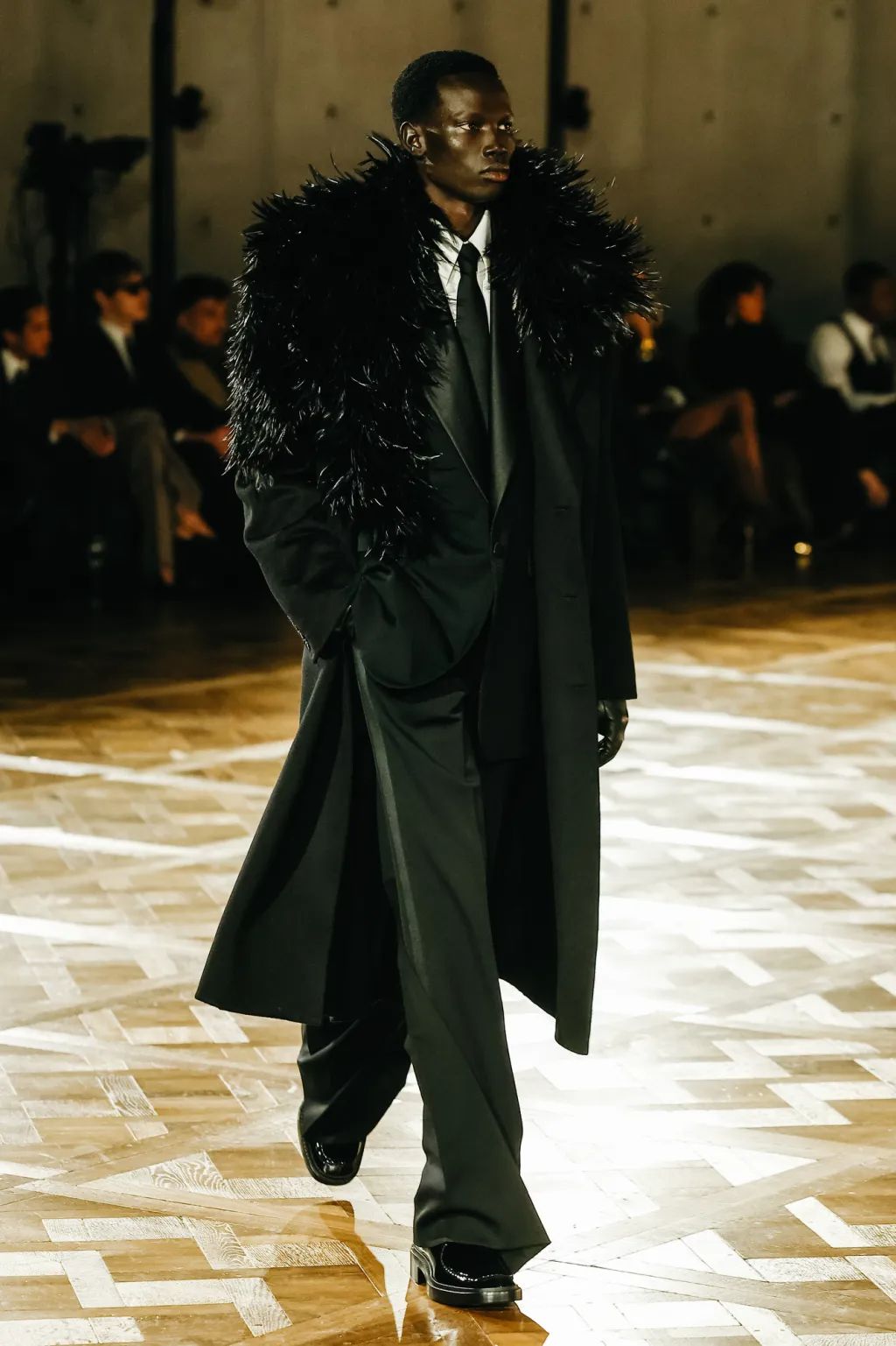 male model walks the fashion week runway