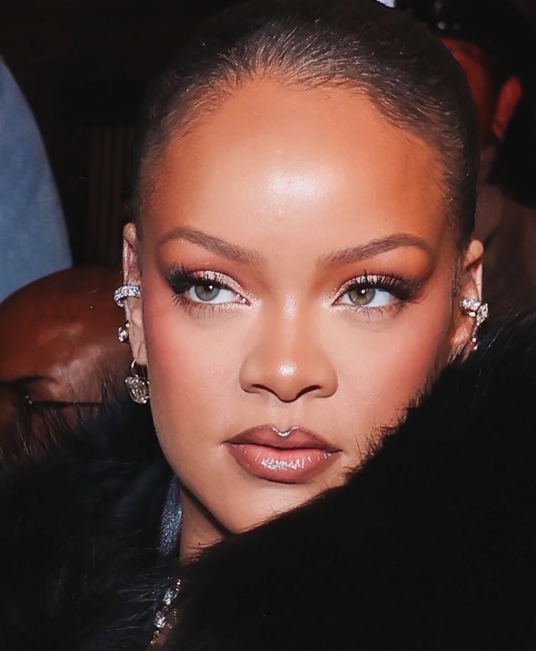 rihanna viral beauty look with shimmer and nude lips