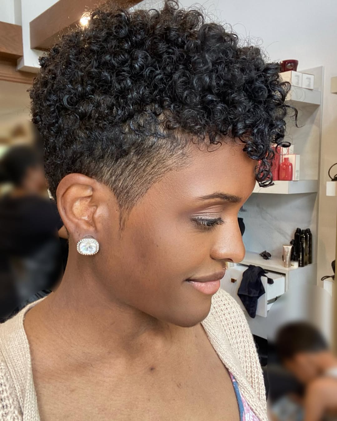 woman with natural hair pixie cut