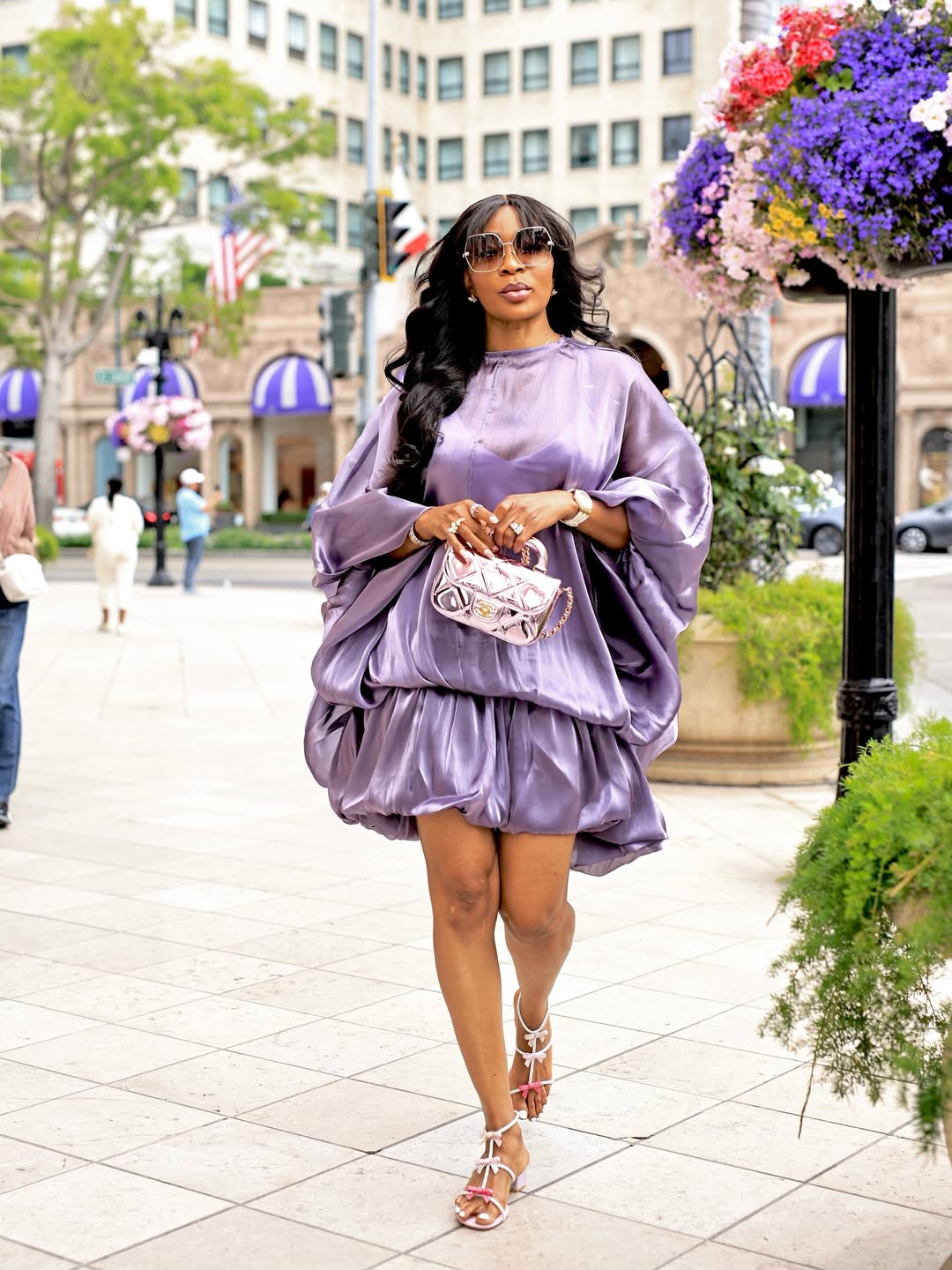 woman wearing purple mini dress culture influences fashion
