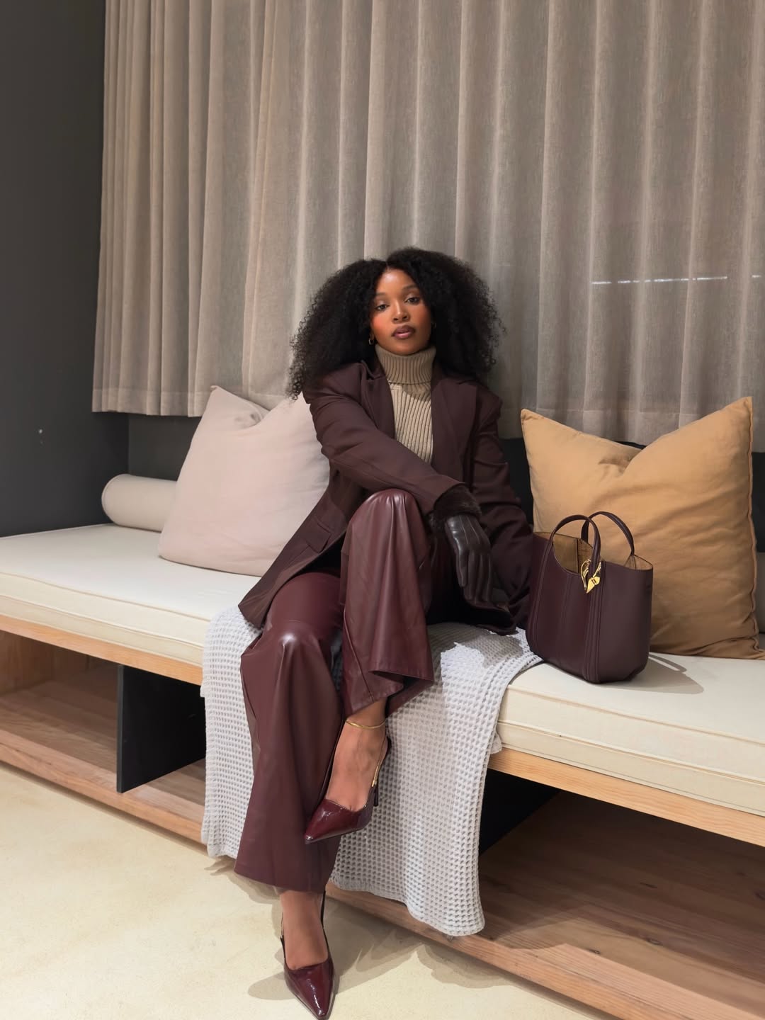 woman wearing all-brown suit