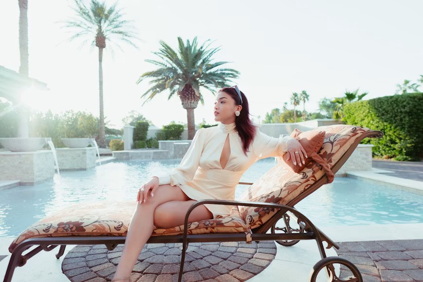 new marker of luxury woman at swimming pool resort