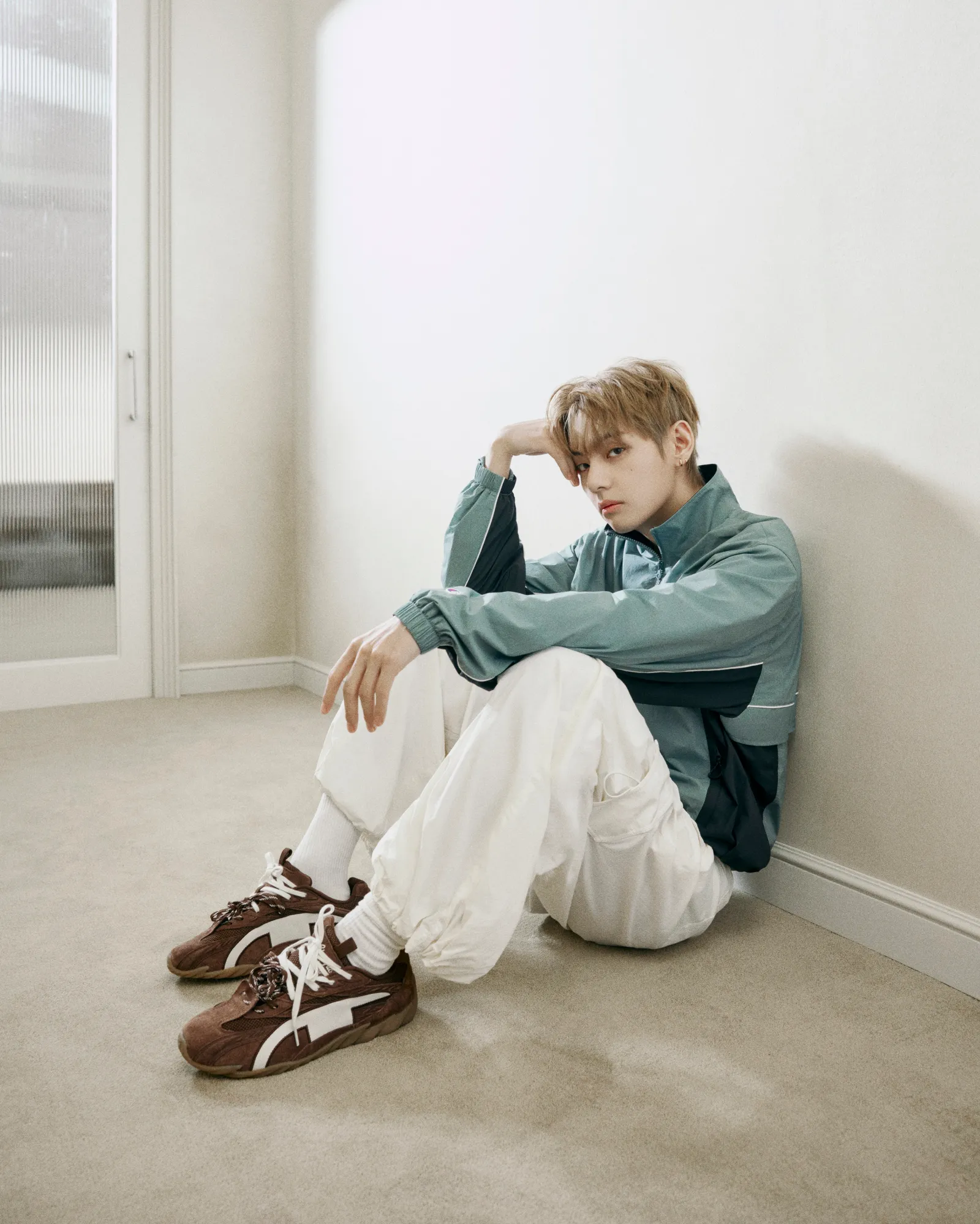 V Kim Taehyung in a Champion sweatshirt and classic athletic pieces for the True Champion FW26 global campaign